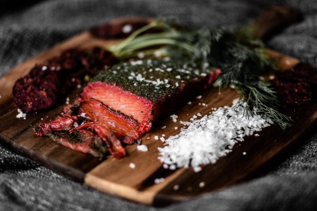 Himalayan salt flakes finishing a dish